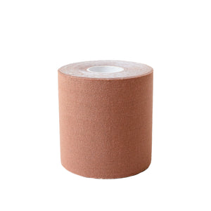 Tan boob tape roll front view.