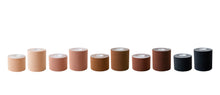 Load image into Gallery viewer, Ten good lines boob tape rolls in five different colors side by side. From left to right is black, dark brown, brown, tan, and beige.