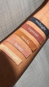 Good lines boob tape color swatches in the colors black, dark brown, brown, tan, and beige.