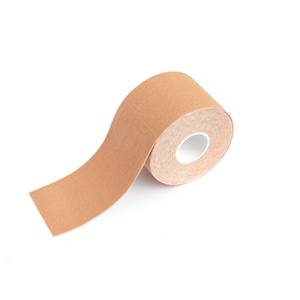Good lines beige boob tape roll side view lightly unrolled.